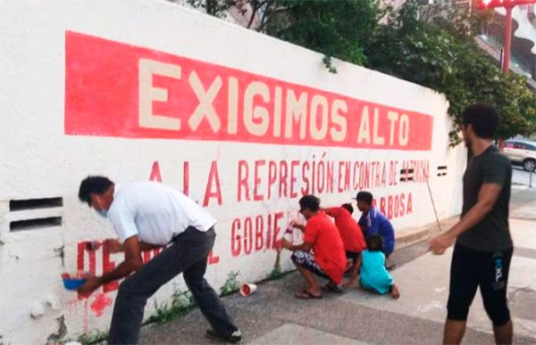 Con pintas en Acapulco, denuncian política represiva del Gobierno de Puebla