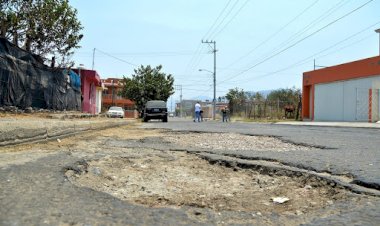 CRÓNICA | Entre baches y sin transporte público en Jalisco